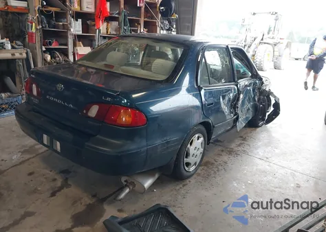 1999 Toyota Corolla Le z USA, uszkodzony, nr VIN 1NXBR18EXXZ169977